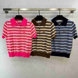 Designer t -shirt vrouwen vroege lente nieuwe high -gehared woon -werkverkeer stijl brief jacquard polo kraag stripe contrast gebreide wol f56525N
