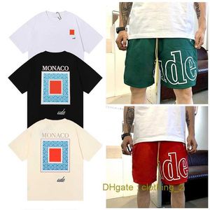 Diseñador T Shirts Pantalones cortos para hombre Ropa de mujer Camisetas gráficas Patrón Tops Verano Manga corta Camiseta Hip Hop Letra Graffiti Imprimir suelto Rhude Causal Pantalones HVOQ