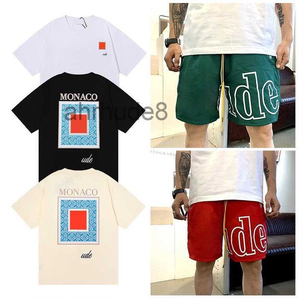 Diseñador T Shirts Pantalones cortos para hombre Ropa de mujer Camisetas gráficas Patrón de verano Camiseta de manga corta Hip Hop Letra Graffiti Impresión suelta Rhude Causal Pantalones 9E5C