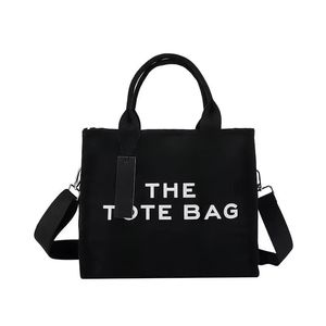 Diseñador The Tote Bag Moda Hombro Mujer Bolso Bolso Mini Cuero Lona Crossbody Compras Totes de lujo Bolsas Negro Grandes Marc Bolsos al por mayor