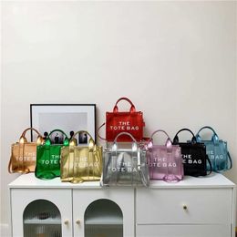 Designer The Tote Bag Dames Handtas 2023 Nieuwe Modieuze Handheld Bright One Shoulder Crossbody Hoge Capaciteit Koreaans Internet Rood Premium Sense Tote Bags