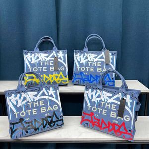 Ontwerper De Tote Handtas Tas Tas Bag Ladies Painted Graffiti Canvas Bag Tas Tote Handtas Tas Tas Shopping Men Multifunctionele decoratie Twill met logo -letters