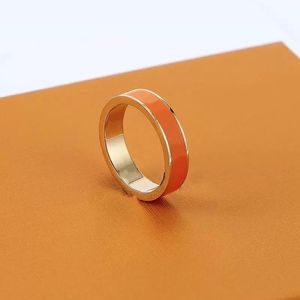 Designer Titanium Steel Band Anneaux Bijoux De Mode Hommes Bague Simple Colle Noir Blanc Rouge Dames Cadeau Designer Pour Femmes Cadeaux De Luxe Bijoux