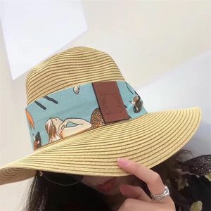 Designer top chapeau femme paille de paille de luxe chapeau de soleil plage largeur chapeau femelle femelle de seau d'été papier herbe tas de bonnet du chapeau tissé capuchons décontractés casquettes