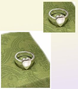 Designer Top Luxury Silver Ring Fashion Men et les femmes ne se décolorent pas les couples de conception d'origine bijoux de bijoux entier71544527962082
