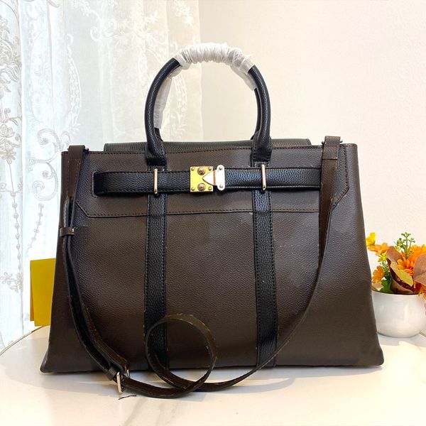 Bolso de mano de diseñador Bolso grande de invierno Bolso de hombro de gran capacidad Bolso de mano para mujer Bolsos de compras de viaje de fin de semana Cerrojo de hardware de metal Totes de cuero genuino Negro