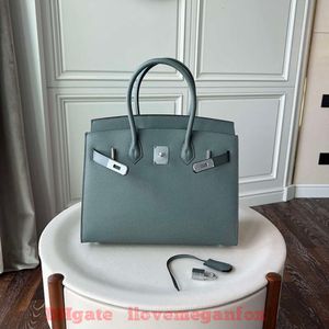 Designer draagtassen Luxe mode Schoudertassen Zilveren knoop buitennaad palmpatroon tas leren handtas mode koeienhuid handtas veelzijdige textuur damestas nieuw