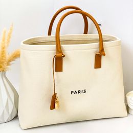 Designer Tote épaule grand commerçant sacs pour femmes Luxury Pochette Crossbodybag Handbag Toile Satchel Claking Beach Bag Mens Week-end Travel The Tote Duffle Sacs