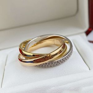 Designer Trinity Ring Charms Femme Couple pour l'homme Titane en acier inoxydable Diamant Tricyclique Cross Gold Anniversaire Bijoux Bijoux