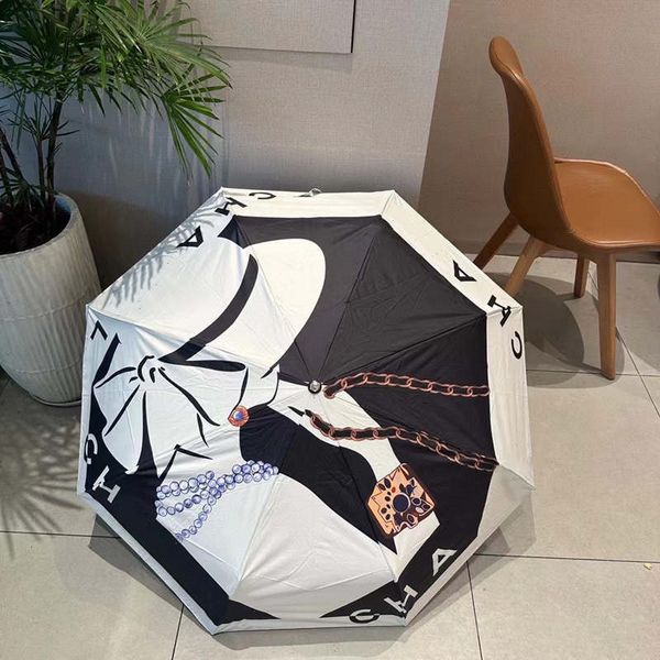 Parapluie de créateur motif sac à fleurs protection solaire protection contre la neige parapluie en caoutchouc noir lettre classique graffiti noir blanc parapluie triple pliage automatique