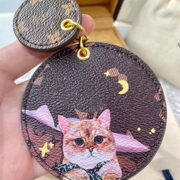 Designer Unisexe Key Wallet Animal Letter Dames Round Metal Keyring Cat Cats Chiens Femelle Keychain Famous Brand Femmes Men Men Ba295m