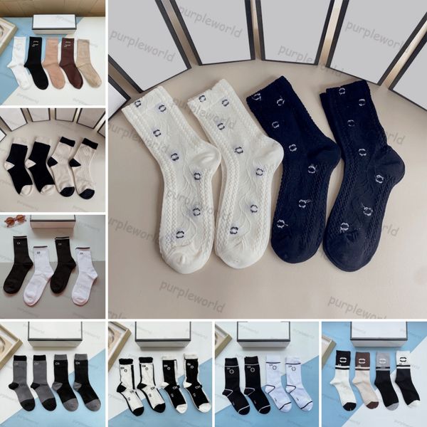 Medias unisex de diseñador Cuatro pares de calcetines bordados con alfabeto de invierno deportivo de moda con caja