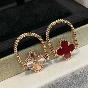 Designer V-Gold High Version Van Double Sided Flippable CNC Precision Caned Quality Red Jade Marrow Four Leaf Ring Fashion Live Generation