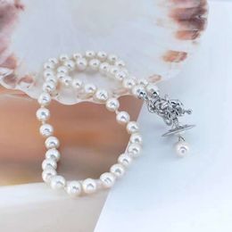 Diseñadora Viviane Westwood Empress Dowager Barroque Pearl Freshwater Pearl 3D Ovni Collar Saturno Luxury y elegante corbata