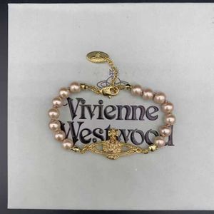 Ontwerper Viviane Westwood Empress Dowager XI's klassieke volledige diamant Saturn Pink Pearl -armband Vrouw Punk High Edition Handwerk