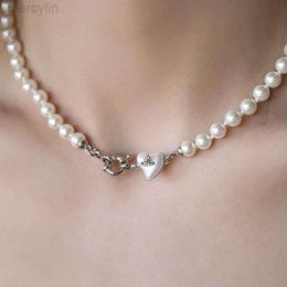 Designer Viviene Westwoods Empress Dowager Xis Love Collana con fibbia rotonda con perle per donna Luce Lusso Versatile e popolare Catena con clavicola francese Semplice