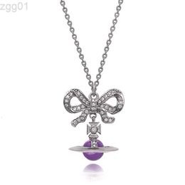 Designer Viviene Westwoods Nouvelle Viviennewestwood Impératrice douairière douairière Bowknot Violet Saturne Collier High Sense Planet Ufo Pendentif Pull Neckchain