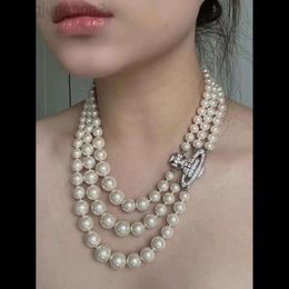 Designer Viviene Westwoods Nouveau Viviennewestwood Impératrice douairière Xi à trois couches avec fermoir magnétique en perles Collier Saturn Collier de perles dégradé robuste haut de gamme