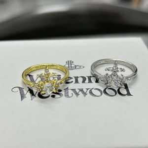 Diseñador Viviene Westwoods Nuevo Viviennewestwood 23 Primavera / Verano Nuevo Anillo de Cruz de Saturno Emperatriz Viuda Occidental Diseño de minoría femenina Anillo de planeta lleno de diamantes