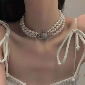 Créateur Viviene Westwoods Nouveau Viviennewestwood Empress Dowager Saturn Collier de perles serti de diamants et de diamants d'eau Advanced Sense Triple Layer Cla