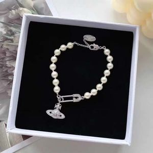 Ontwerper Vivienen Westwoods Nieuwe Viviane Ansey Empress Dowager Saturn Pearl broche Bracelet Vrouw Ins Minderheid Highgrade Licht Luxe veelzijdige mode