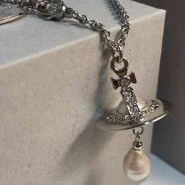 Designer Vivienen Westwoods Nouvelle Viviane Haute Version Impératrice Douairière 3d Saturne Perle Goutte D'eau Collier Femme Personnalité Planète Pendentif Chandail Chaîne