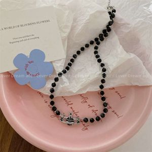 Ontwerper Viviennes Westwoods Vivenne Westwoods sieraden Koreaanse New Water Diamond Saturn Empress Dowager West Black Beaded Necklace Sweet and Cool Small Crowd Colla