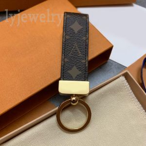 Diseñador monedero llavero dragonne llavero de lujo mini regalo para novia encantos de bolso de lujo con chapado en oro parte de metal diseñador llavero moda B23