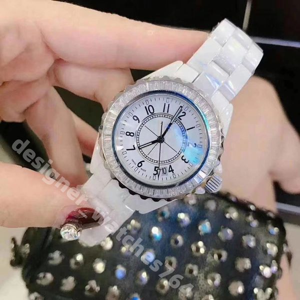 Designer Watch Femmes Céramick Ceramick White et Black Diamond Watchs Wrist Wistors Quartz Fashion Classics Watchs Sapphire Design de bonne qualité Relojes de haute qualité