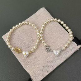 Designer Westwood Saturn Alien Love Pearl Bracelet High Version WestwoodTar Light Luxury Peach Heart Heart