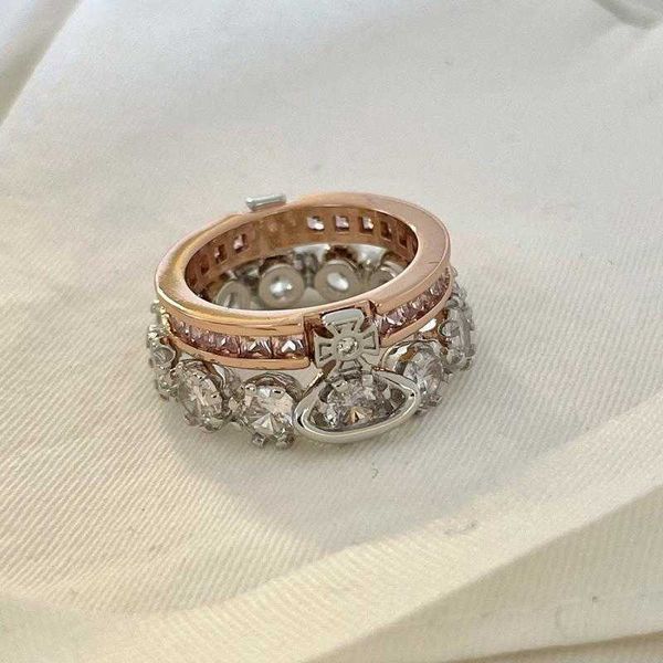 Le designer Westwoods Double Layer Ring est plein de diamant Crown Saturne peut être divisé et couple en couple en direct de nombreuses vies Nail