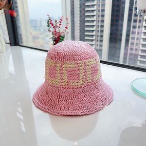 Sombreros de ala ancha de diseñador Sombrero de cubo de lujo Gancho de mano de verano Sombrero de paja Tejido Sombrilla Ocio Protector solar Compras Turismo Sombrero