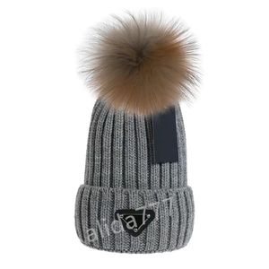 Diseñador Gorro de invierno Gorro de punto Gorro de lana Hombres Mujeres Punto grueso Grueso Cálido piel sintética pom Gorros Sombreros Gorro femenino 14 colores