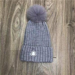 Designer hiver tricoté bonnet de laine chapeau femmes gros tricot épais chaud fausse fourrure pom bonnets chapeaux femme bonnet bonnet casquettes 11 couleurs de haute qualité A554