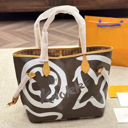 Designer Donna Accessori Borsa tote Graffiti Francia Marchio di lusso L Never e monogrammi completi Modello in tela Borsa shopping Borse a tracolla da donna con custodia Taglia MM