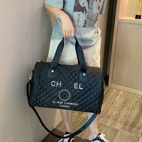 Designer Channel 2024 Bolsa de viaje Nueva moda Cyber Gym Bolsa de fitness Tendencia de viaje Bolsa de hombro de estilo occidental Bolsa de mujer Cartera Bolsa redonda