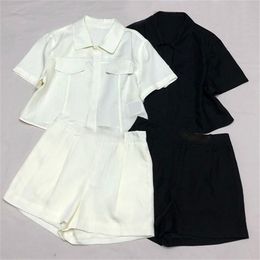 Diseñador de camisas de blusa para mujeres pantalones pantalones cortos de manga corta de lujo