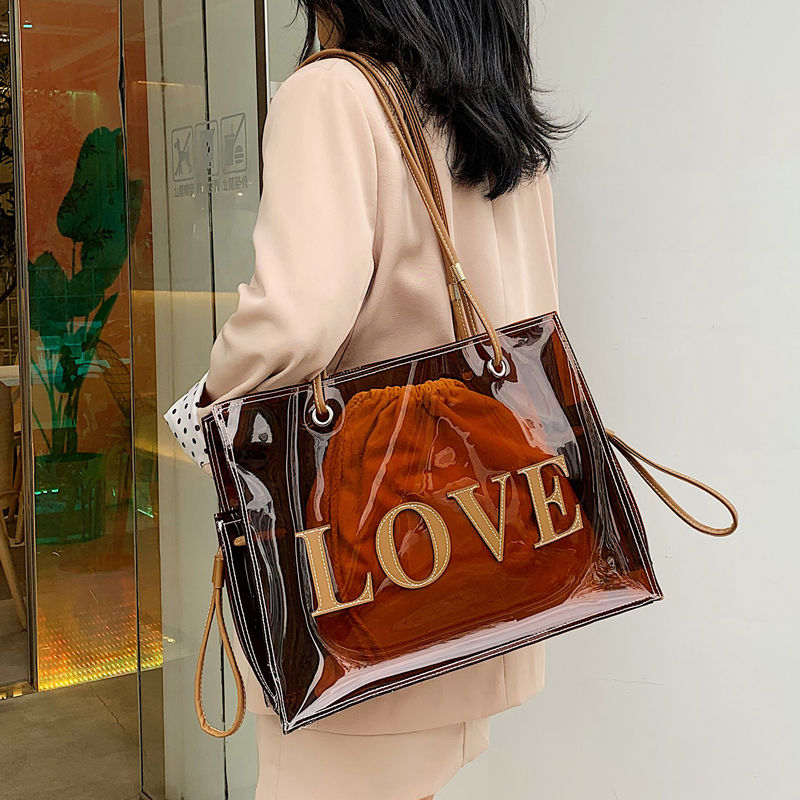 デザイナーの女性クリアPVCトートバッグ2023新しい韓国ファッション大容量容量ショルダーバッグ透明な買い物客のハンドバッグ財布
