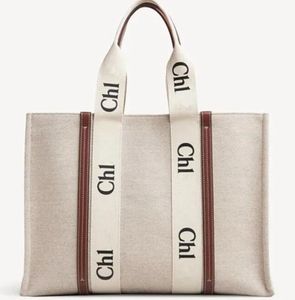 Designer Women Handtassen Beach Vacation Tote Shopping Bag Handtas 7a Kwaliteit canvas mode grote strandzakken luxe designer reis schoudermogelijkheden portemonnees