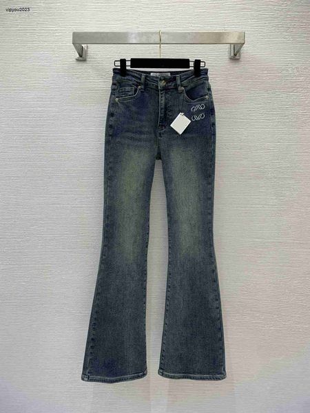 Diseñador mujer jeans marca ropa damas bolsillo logo bordado etiqueta de cuero decorado con cintura alta elástico delgado y pantalones 11 de enero