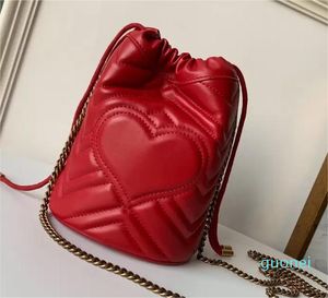 Designer-Femmes Luxurys Designers Sacs à main vendant Marmont Sac Nouveau style Mini Seau Chaîne d'or Sweet Heart Motif Véritable Cros en cuir