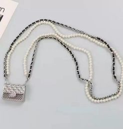 Designer Women Metal Wallet Lady Bags Diamond Hollow Mini Pearl Chain Taille Bag Coin Purse Retro Cross Body Bag Schoudertassen Hoofdtelefoonzak