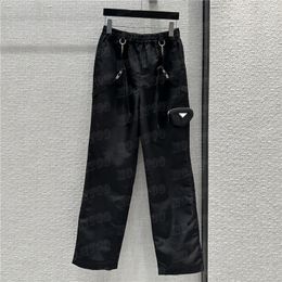 Designer dames nylon rompertjes Cargo-broek met metalen badge Zakken Hoge taille Casual broek met rechte pijpen