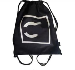 Designer Women's Fashion Black White Canvas Sac Classic Logo Sac à dos Sac à provisions de grande capacité Sac à bandoulière Sac sur environnement portable