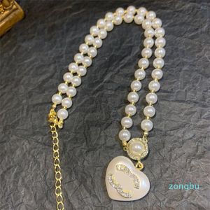 Cadeau de créateur pour femmes, collier pendentif d'amour, cadeau de fête de mariage, longue chaîne de luxe, bijoux de printemps, perle d'amour, longue chaîne, vente en gros