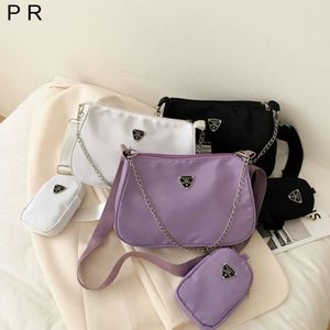 Designer Women's Handbag Store % 60 Vente en gros au détail Livraison gratuite Nouveau petit sac à bandoulière pour femmes sous les bras unique décontracté bandoulière mère