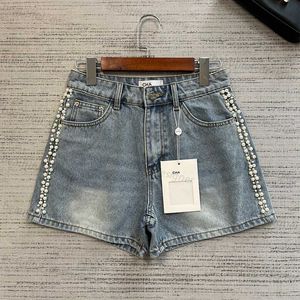 Designer dames jeans high -end 24SS zomer nieuwe zware industrie parel decoratie zachte denim shorts aan beide kanten