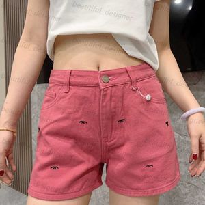 Designer dames jeans lente/zomer hoog geurige roze kleine zwart borduurwerk gepersonaliseerde rose rode washenim shorts voor vrouwen