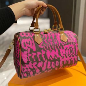 Designer Femmes Speedy 30 Graffiti Sac fourre-tout Luxurys Designers Sacs imprimés Sacs à main Lady Monogrammes Cuir Toile Oreillers 214m