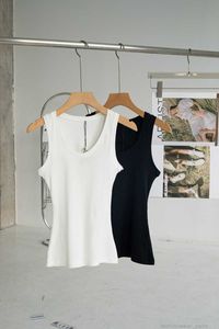 Diseñador Mujeres Tanques Camis Anagrama bordado Camisetas sin mangas de mezcla de algodón Pantalones cortos Faldas de diseñador Traje de yoga Vestido de dos piezas Sujetador Chaleco Señoras Sólido Vintage Camiseta Femme 23